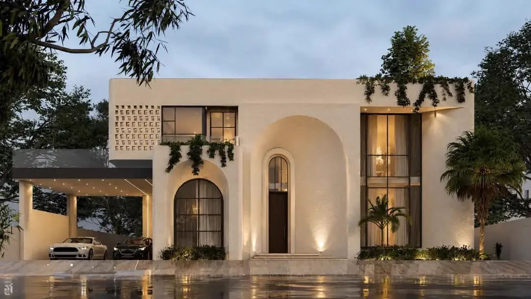 Modern arched villa elevation at dusk designed by Planet Builders & Interiors