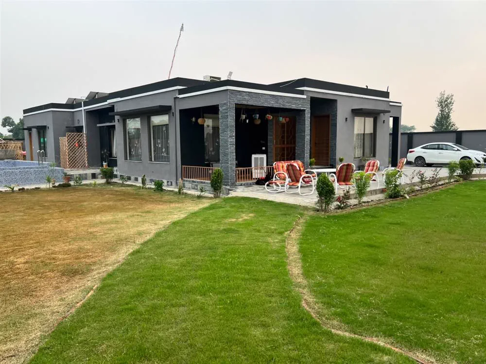 Completed Planet Builders & Interiors home with landscaped lawn