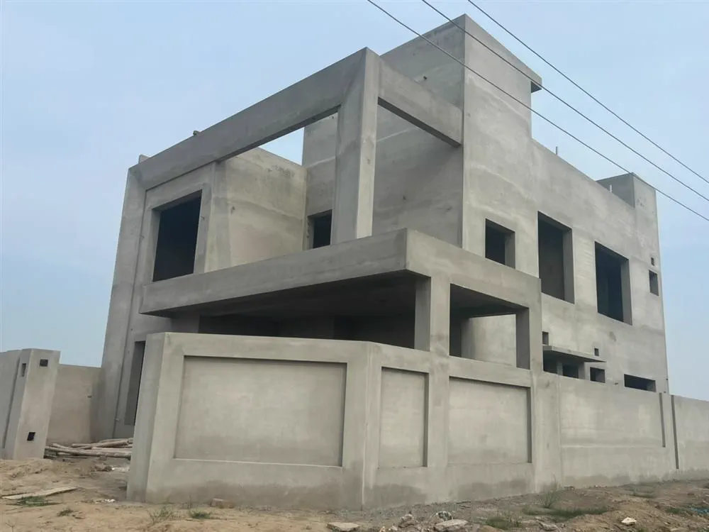 Grade 60 steel reinforcement in a grey structure shell built by Planet Builders in Lahore
